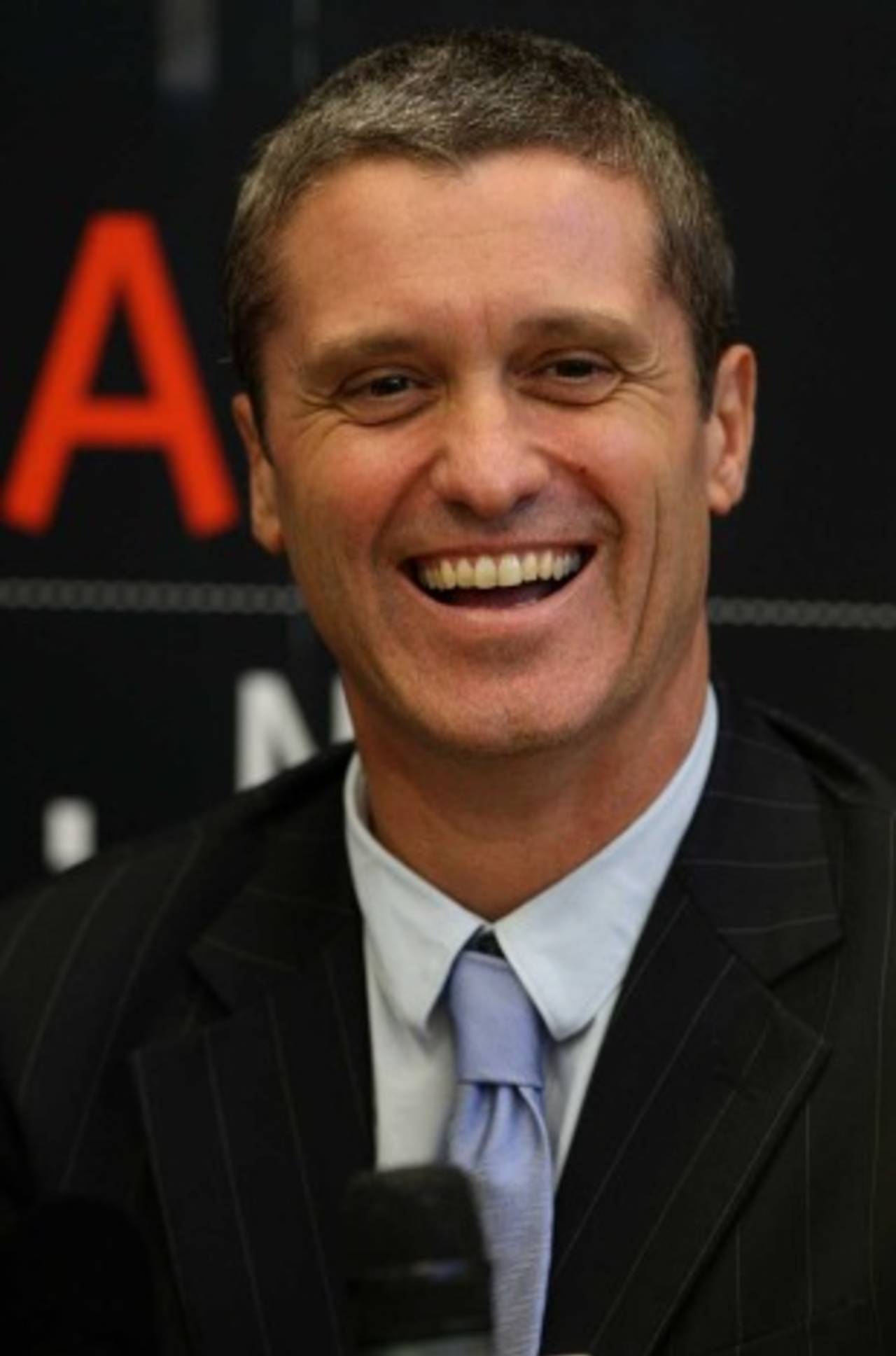 New Zealand Cricket CEO Justin Vaughan is all smiles at a press conference, Auckland, June 21, 2011