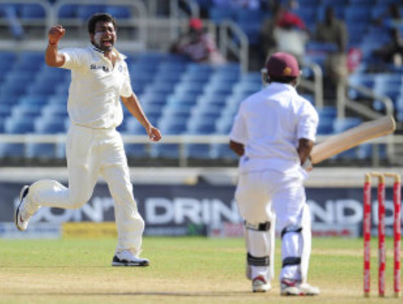 Praveen Kumar celebrates after getting Adrian Barath to edge to third slip, West Indies v India, 1st Test, Kingston, 3rd day, June 22, 2011