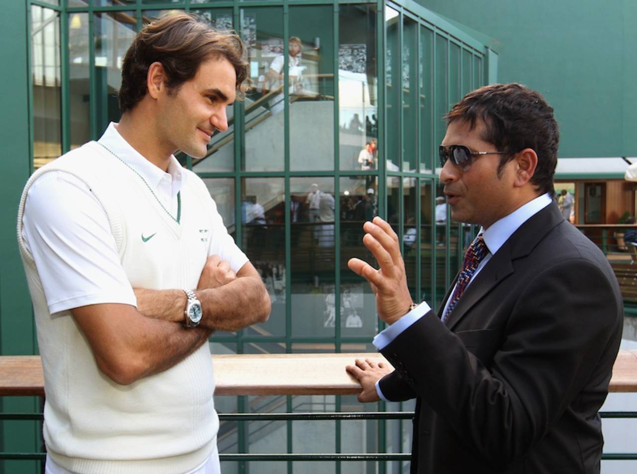 Sachin Tendulkar speaks to Roger Federer at Wimbledon, London, June 25, 2011