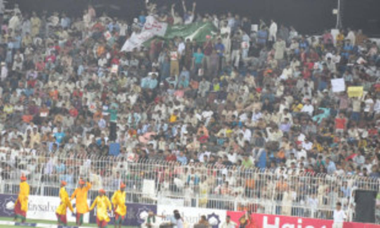 A packed crowd in Faisalabad watches the Faysal Bank T20 tournament, Multan v Rawalpindi, Faysal Bank Super Eight T-20 Cup, Faisalabad, June 28, 2011