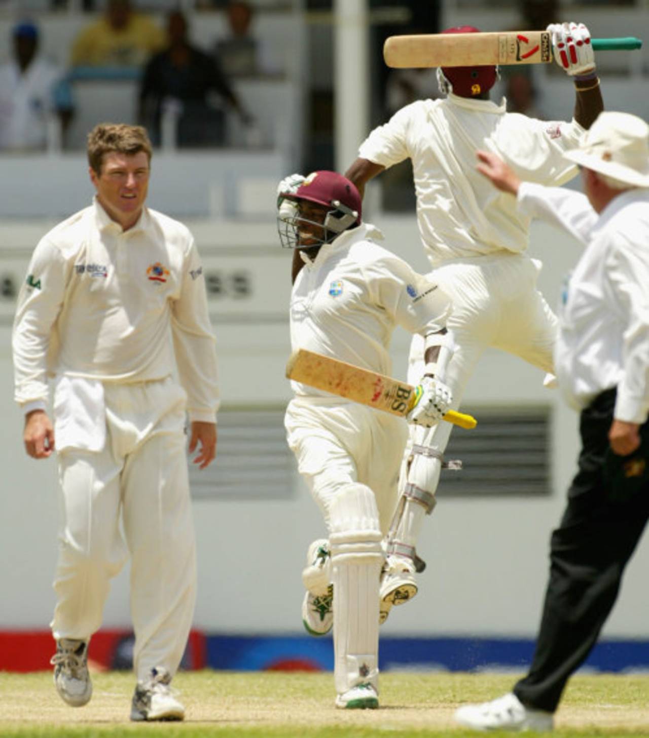 Vasbert Drakes and Omari Banks celebrate the win, West Indies v Australia, 4th Test, St John's, Antigua, 5th day, May 13, 2003