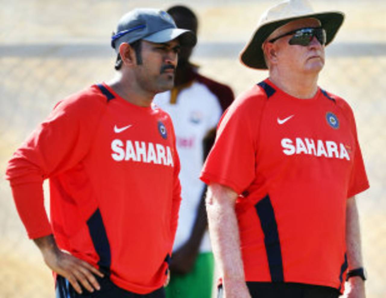 Indian captain MS Dhoni and coach Duncan Fletcher,  watch a practice session, Dominica, July 5 2011