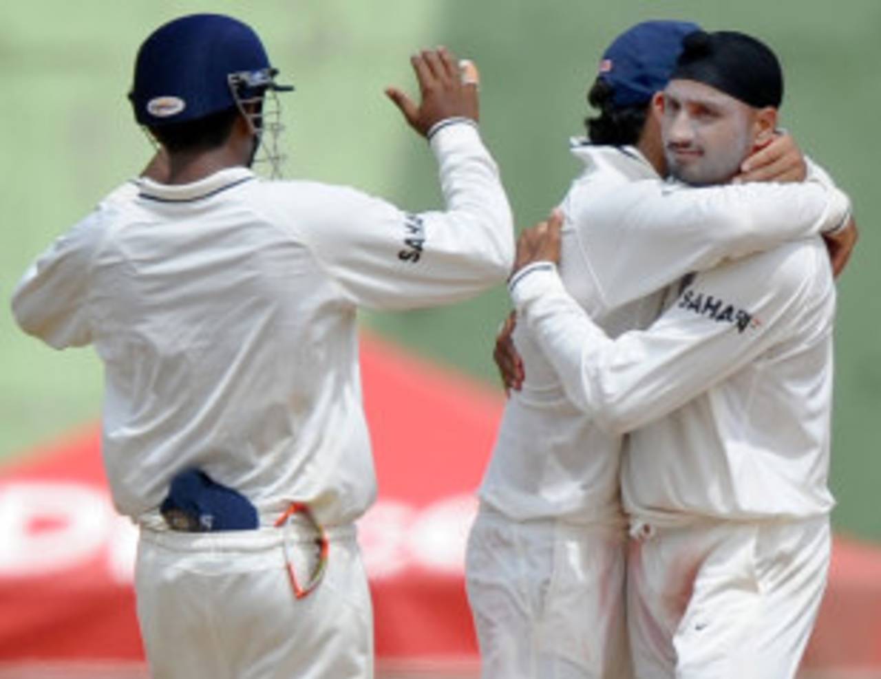 Harbhajan Singh is congratulated on his 400th wicket, West Indies v India, 3rd Test, Dominica, 2nd day, July 7, 2011
