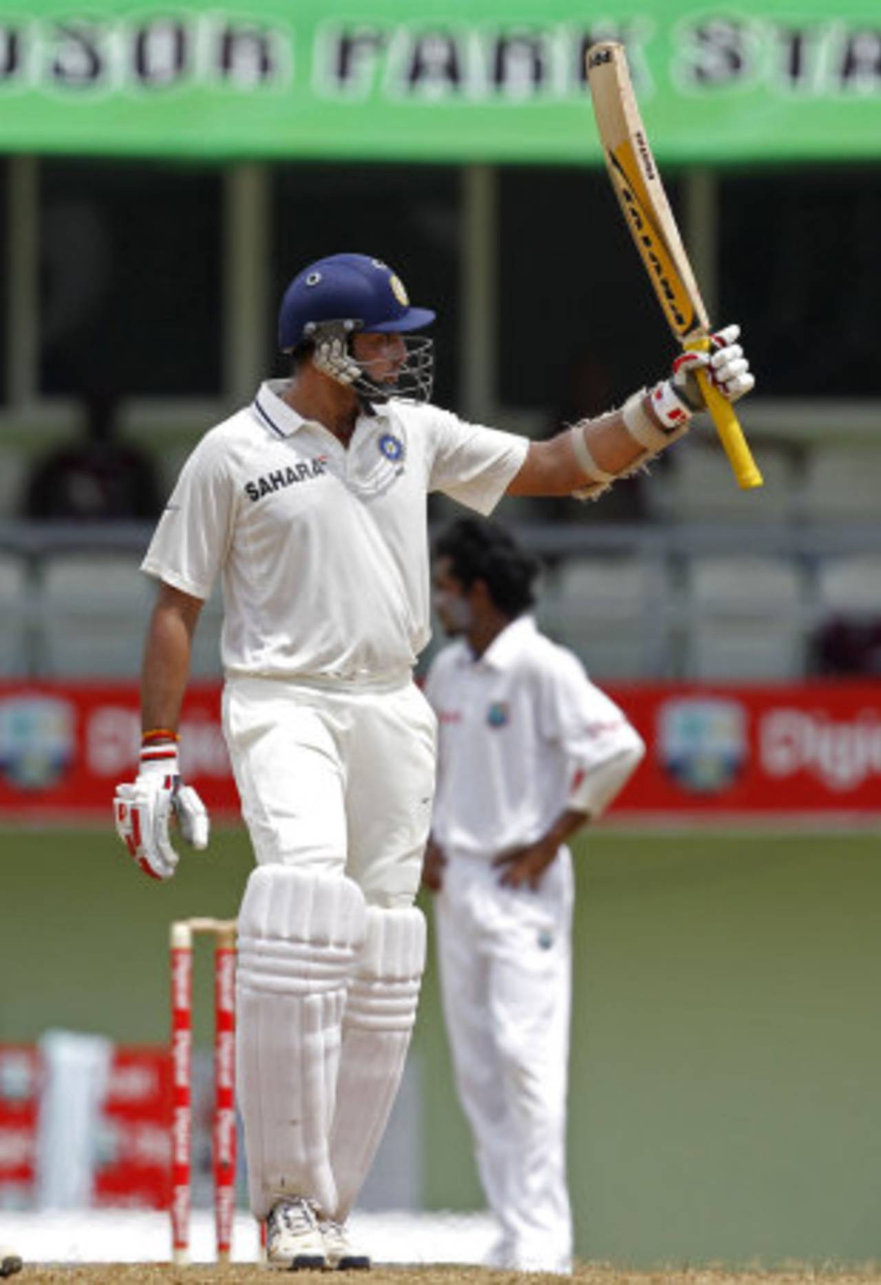 VVS Laxman celebrates getting to a half-century, West Indies v India, 3rd Test, Dominica, 3rd day, July 8, 2011