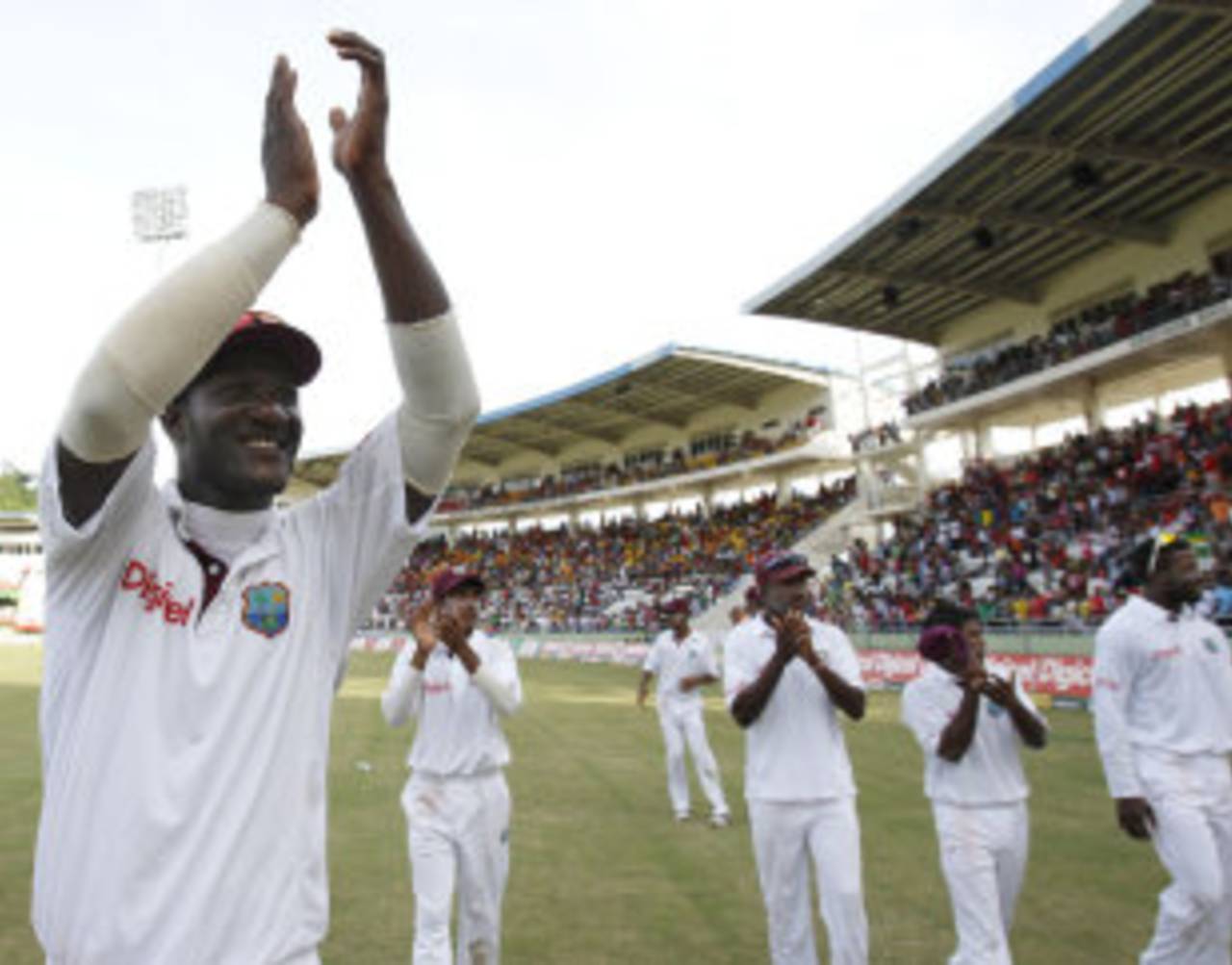 Darren Sammy and the West Indian team salute the crowd for their support, West Indies v India, 3rd Test, Dominica, 5th day, July 10, 2011