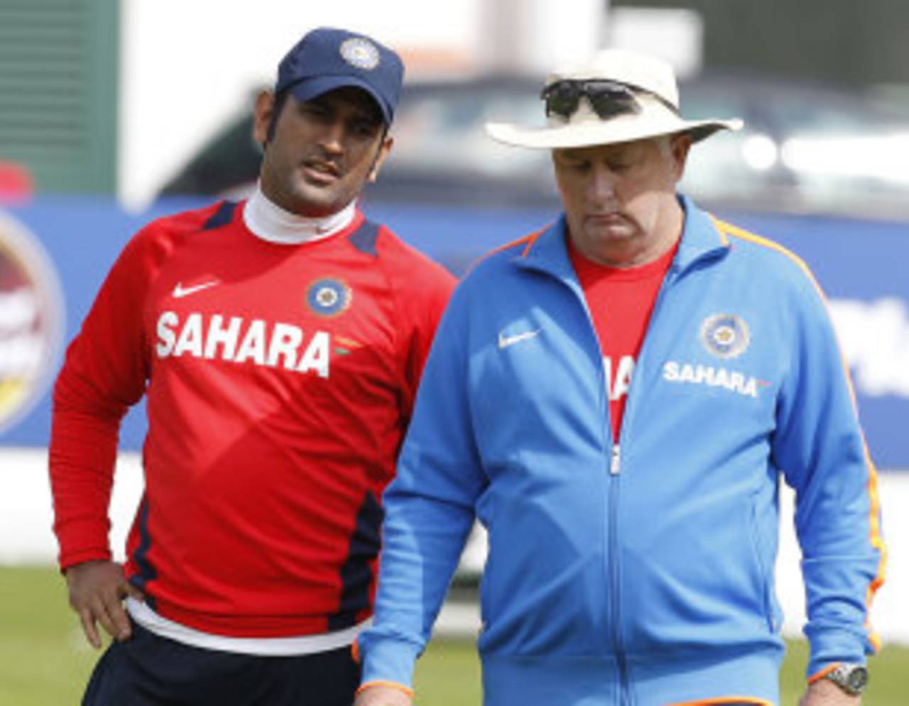 India's captain MS Dhoni and coach Duncan Fletcher share a chat during India's practice session at Lord's July 19 2011