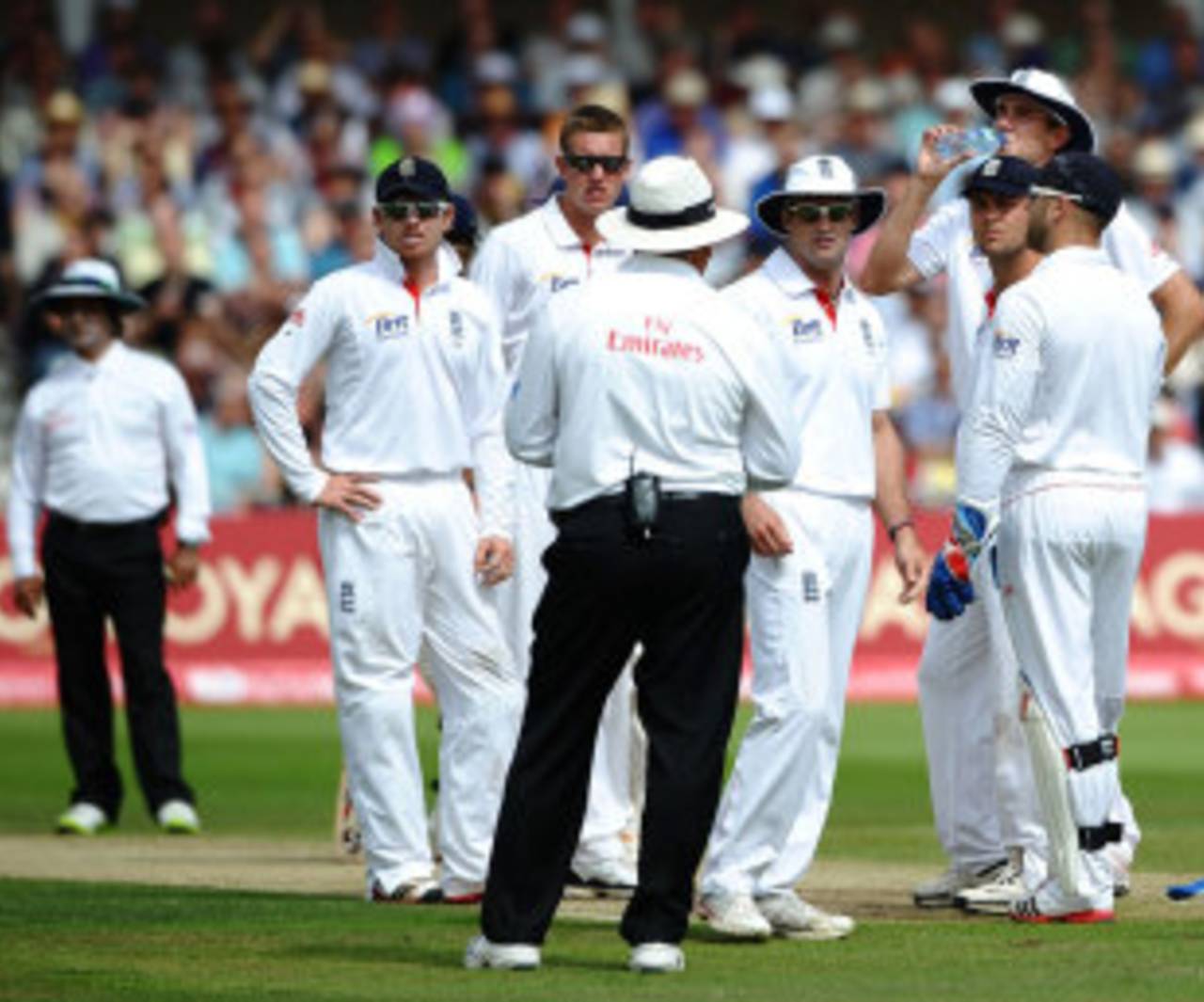 England's players talk to the umpire after a failed review, England v India, 2nd npower Test, Trent Bridge, 2nd day, July 30, 2011
