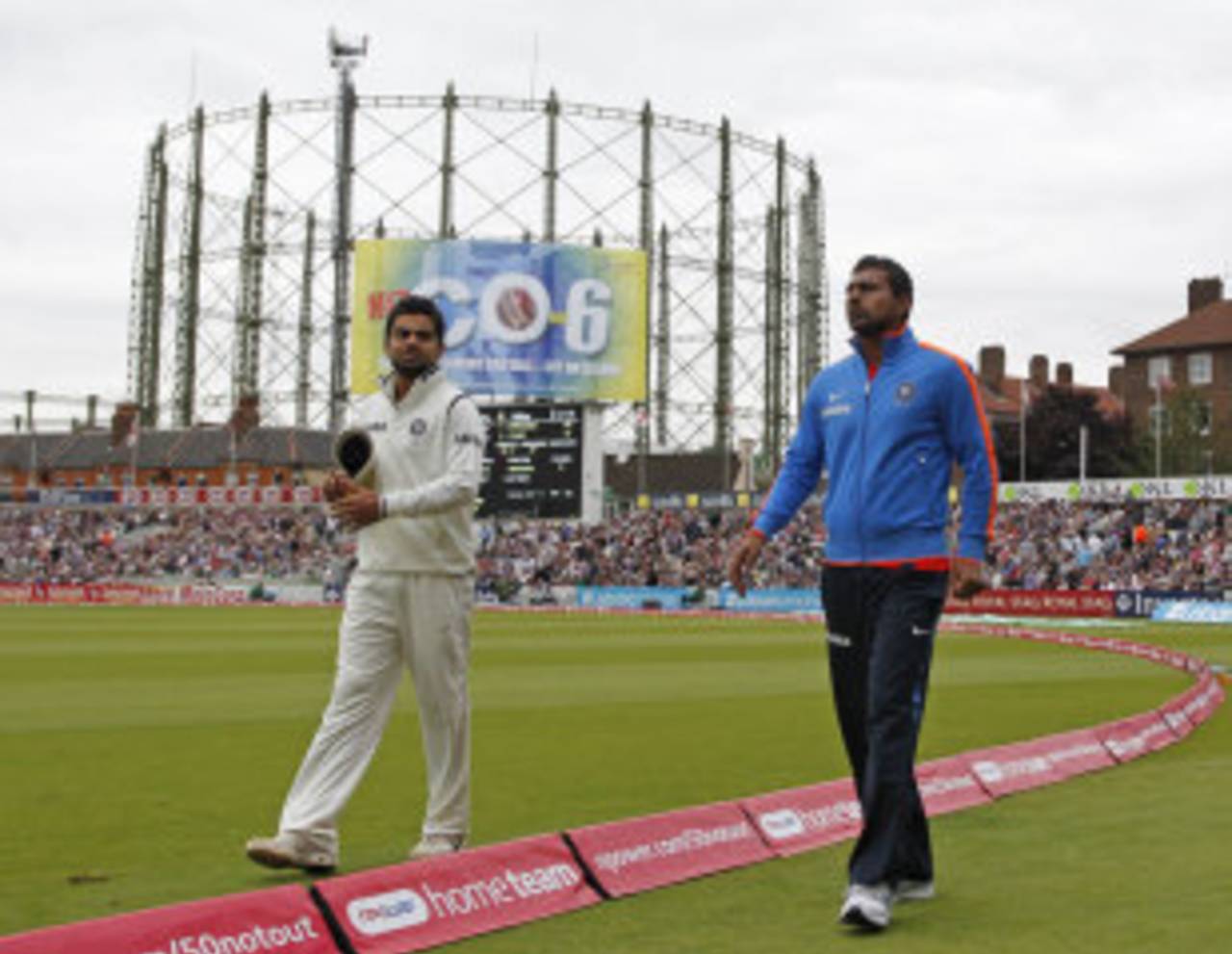 Praveen Kumar, who missed the fourth Test due to injury, has a stroll with Virat Kohli, England v India, 4th Test, The Oval, 1st day, August 18, 2011