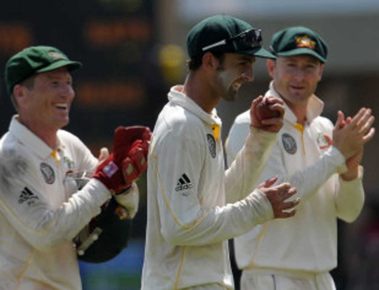 Michael Clarke and Brad Haddin applaud Nathan Lyon's bowling effort, Sri Lanka v Australia, 1st Test, Galle, 2nd day, September 1, 2011