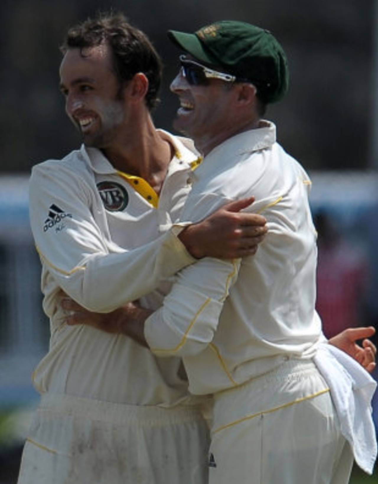 Nathan Lyon and Michael Hussey celebrate the dismissal of Angelo Mathews, Sri Lanka v Australia, 1st Test, Galle, 2nd day, September 1, 2011