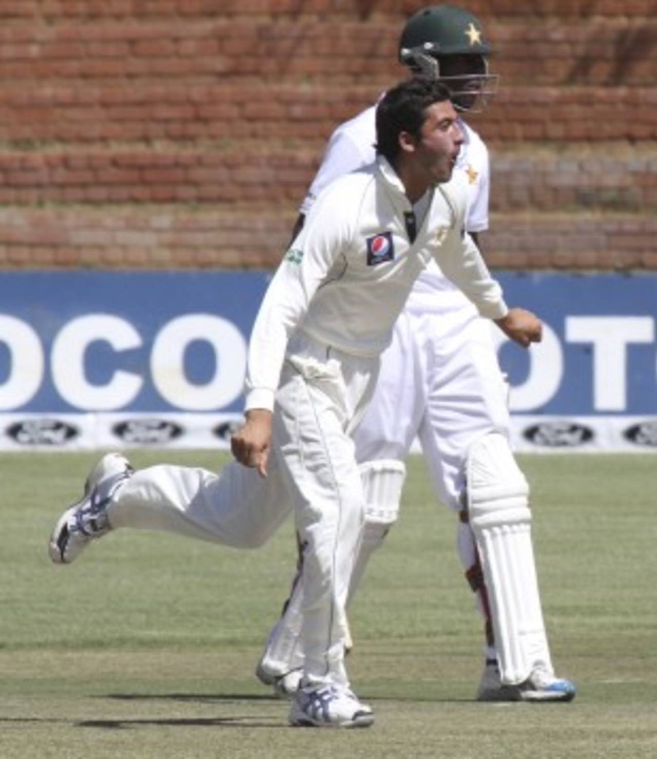 Junaid Khan during his follow through, Zimbabwe v Pakistan, only Test, Bulawayo, 1st day, September 1, 2011