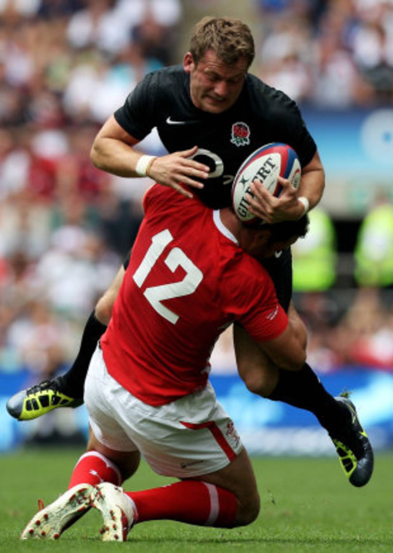 Jamie Roberts tackles Mark Cueto during a friendly, England v Wales, Twickenham, August 6, 2011