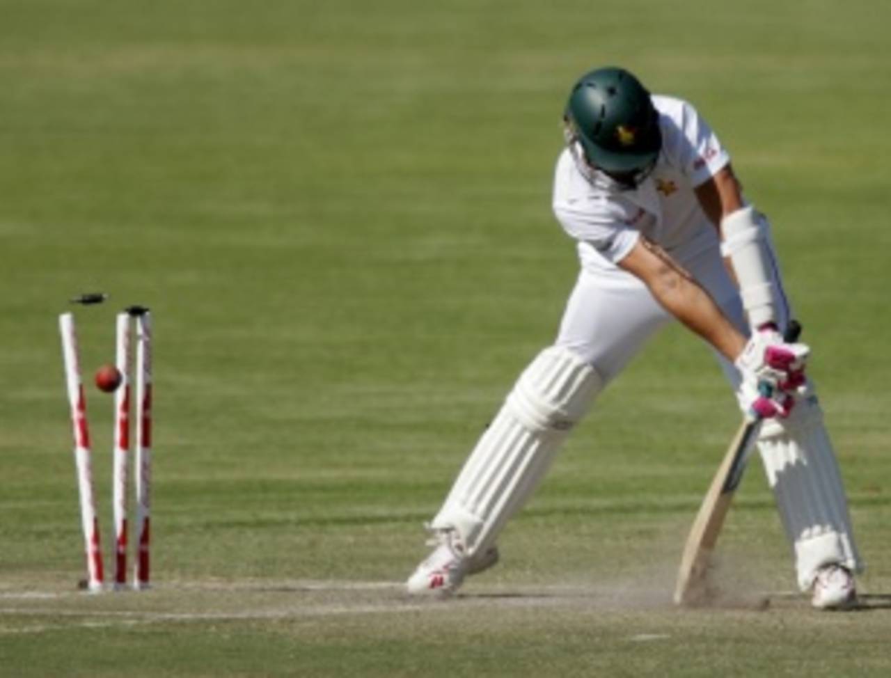 Kyle Jarvis is bowled by a yorker from Aizaz Cheema, Zimbabwe v Pakistan, only Test, Bulawayo, 2nd day, September 2, 2011