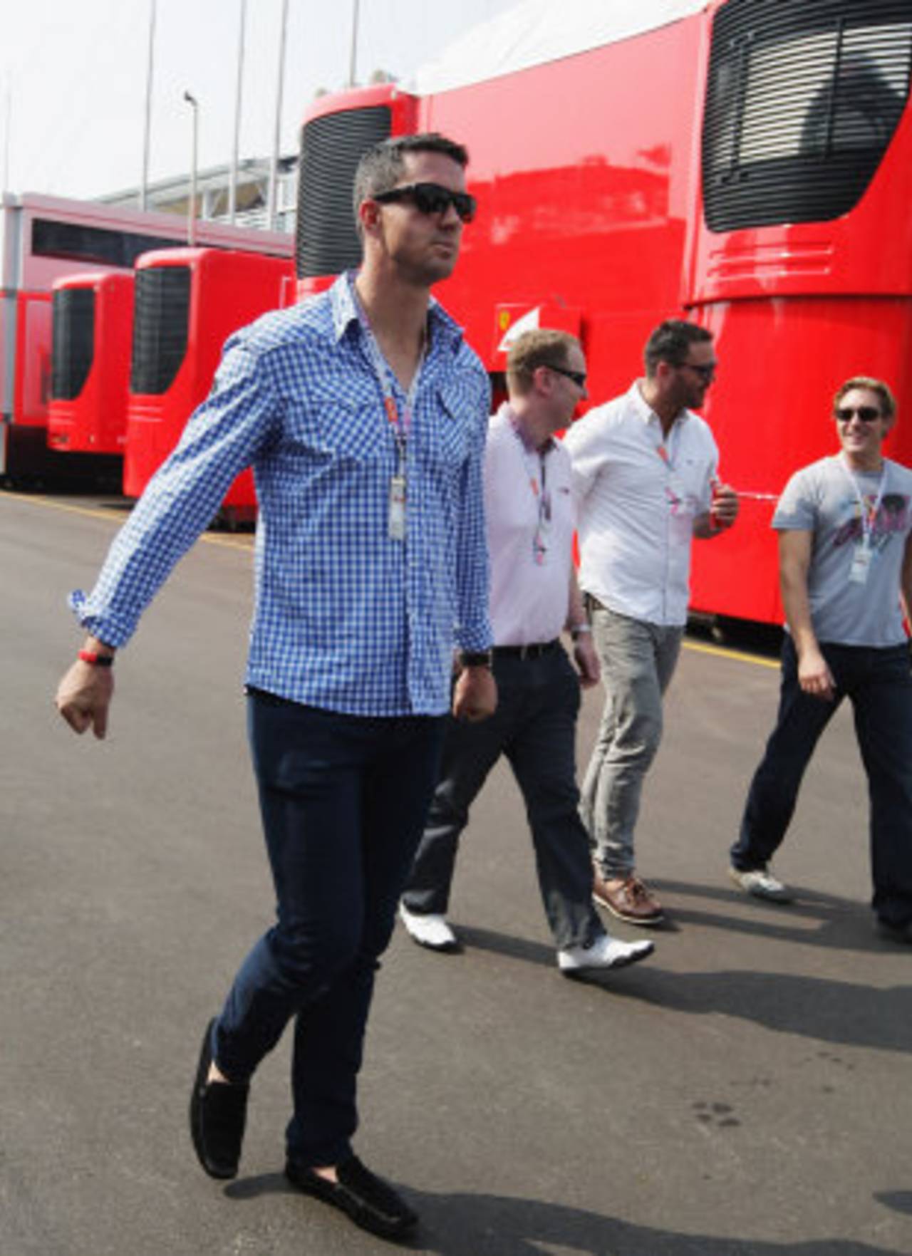 Kevin Pietersen walks down the paddock before the qualifying session for the Italian Formula One Grand Prix, Monza, September 10, 2011