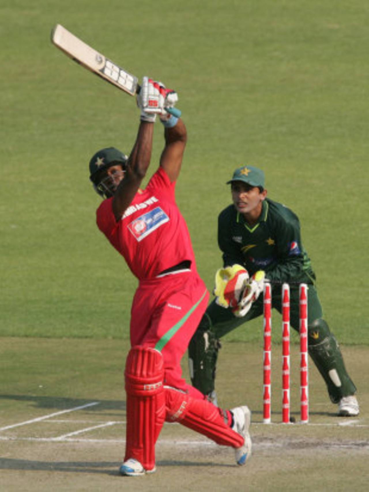 Vusi Sibanda lofts one down the ground, Zimbabwe v Pakistan, 3rd ODI, Harare, September 14, 2011
