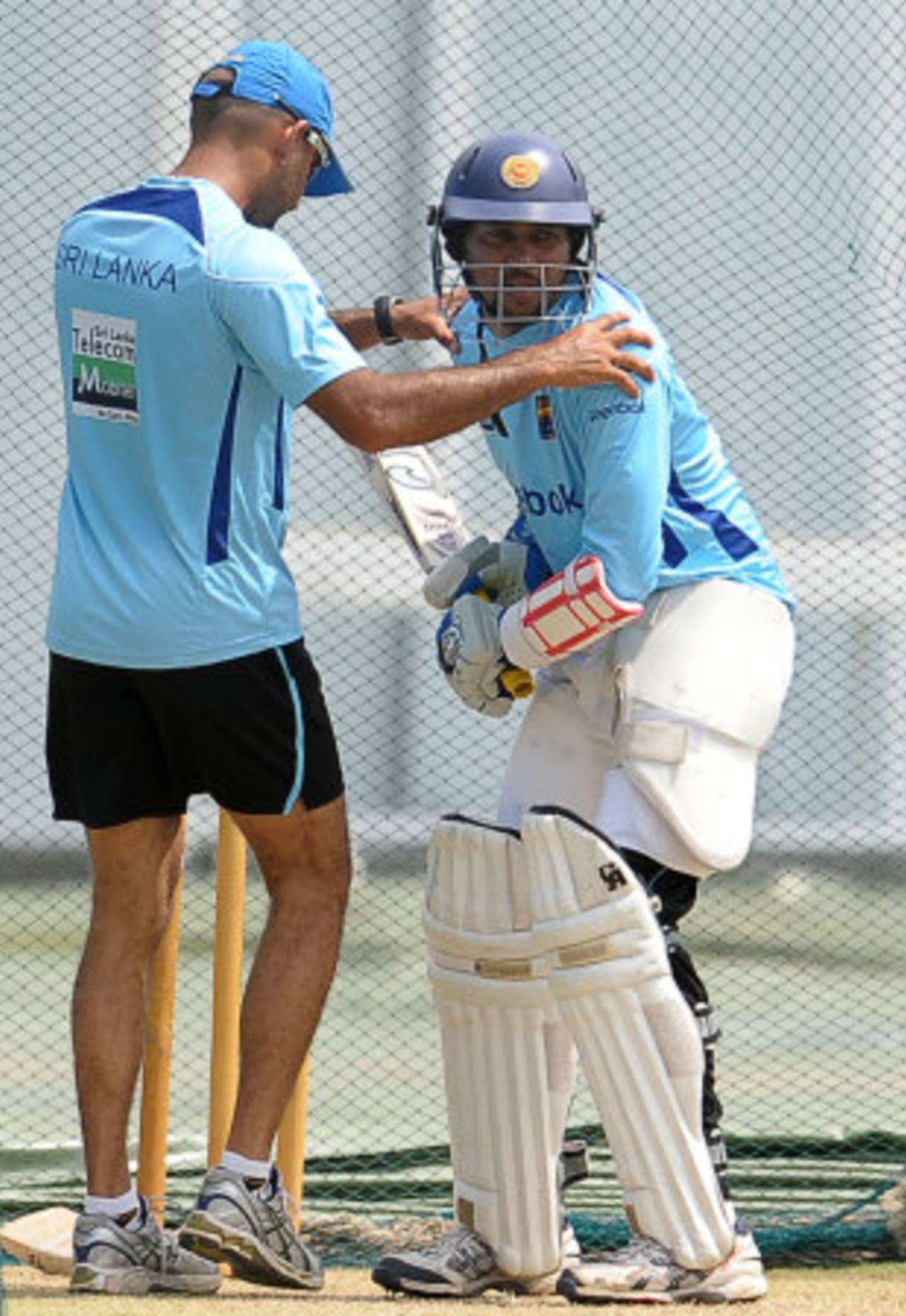 Tillakaratne Dilshan gets some tips from batting coach Marvan Atapattu, Colombo, September 15, 2011