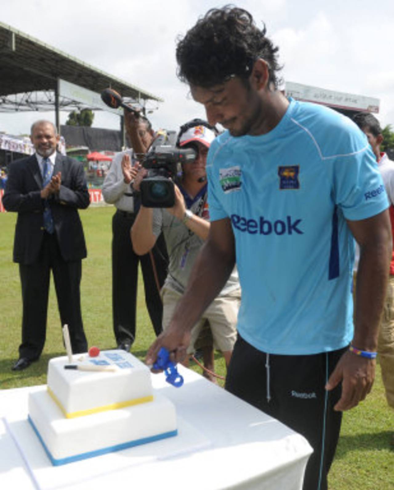 Kumar Sangakkara celebrates the occasion of his 100th Test with a cake, Sri Lanka v Australia, 3rd Test, SSC, Colombo, 1st day, September 16, 2011