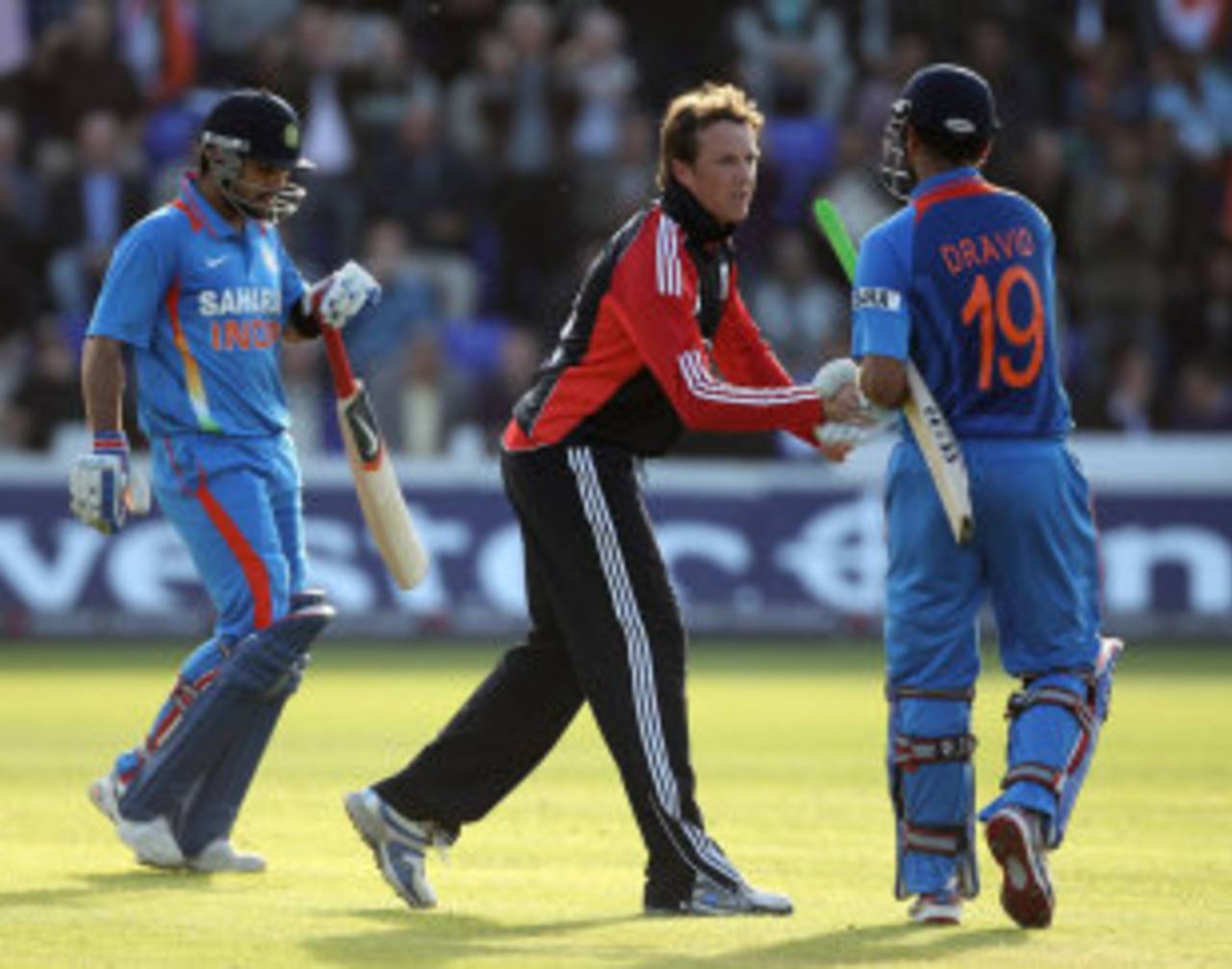 Graeme Swann shakes Rahul Dravid's hand as he walks back for 69, England v India, 5th ODI, Cardiff, September 16, 2011