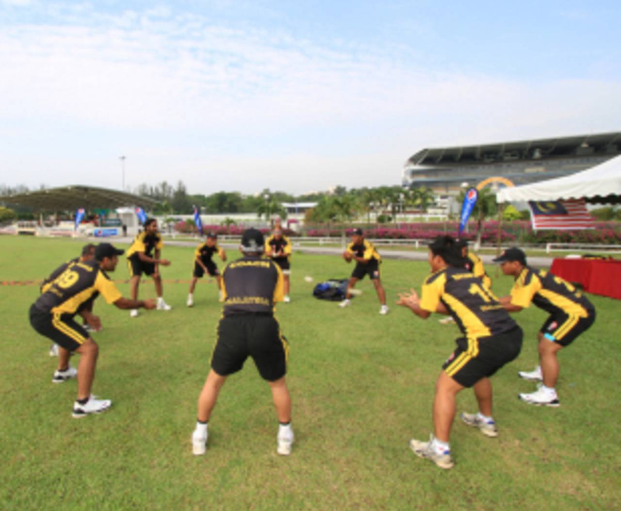 Malaysia's cricketers warm up before their match against Kuwait&nbsp;&nbsp;&bull;&nbsp;&nbsp;ICC/Peter Lim 