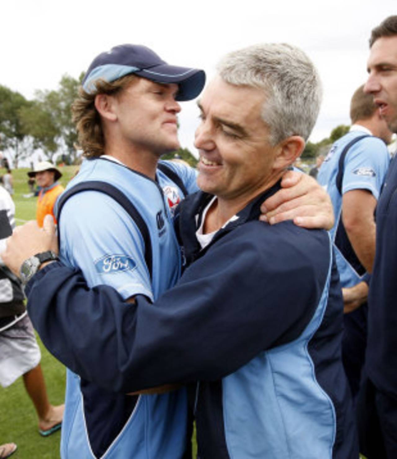 Lou Vincent hugs coach Paul Strang after Auckland's victory in the one-day final, Canterbury v Auckland, Christchurch, February 13, 2011