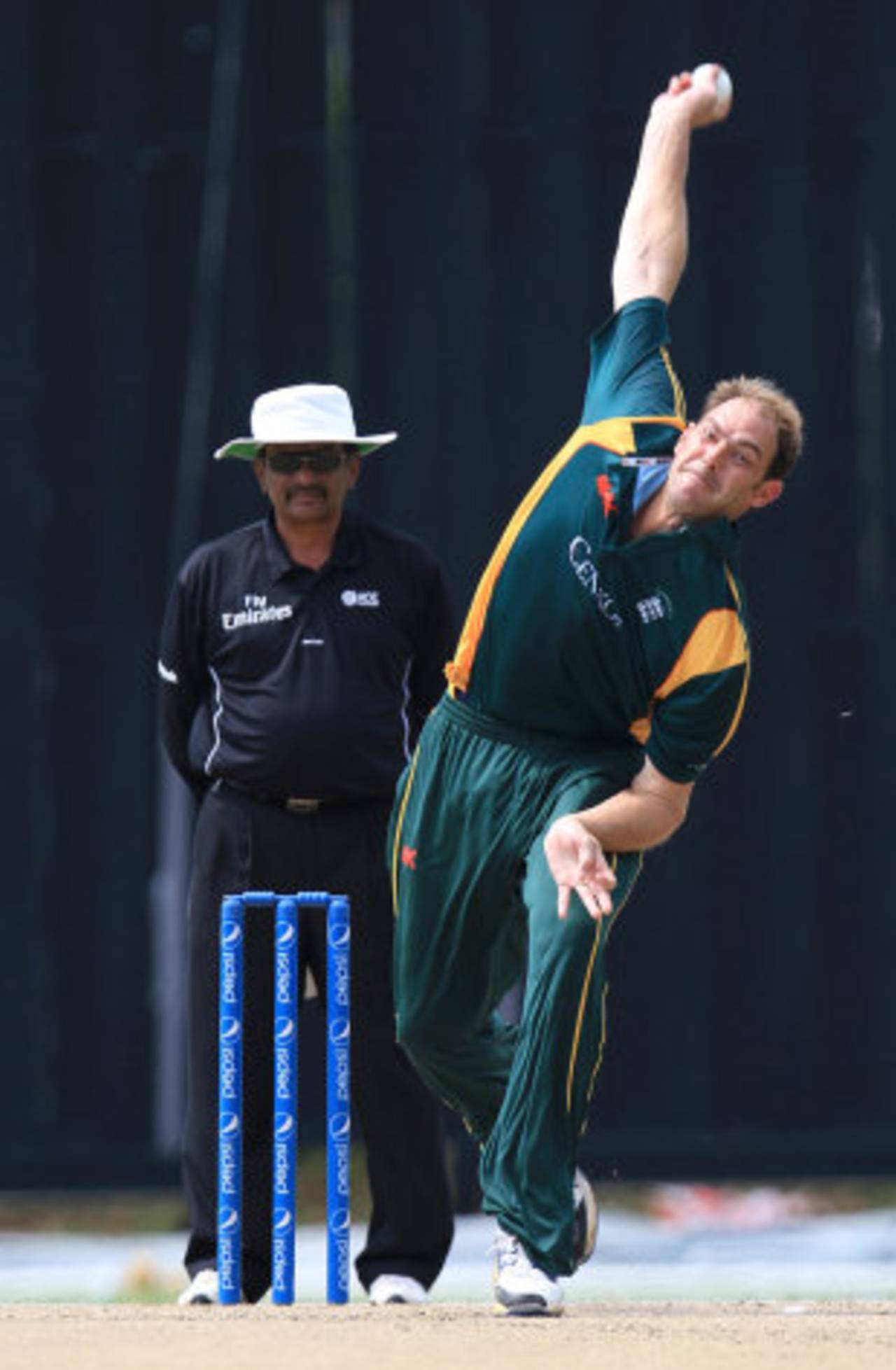 Lee Savident has a bowl, Malaysia v Guernsey, World Cricket League Division Six, Kuala Lumpur, September 23, 2011