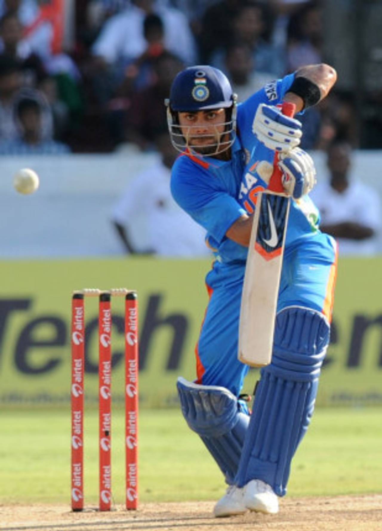 Virat Kohli punches down the ground during his 37, India v England, 1st ODI, Hyderabad, October 14, 2011