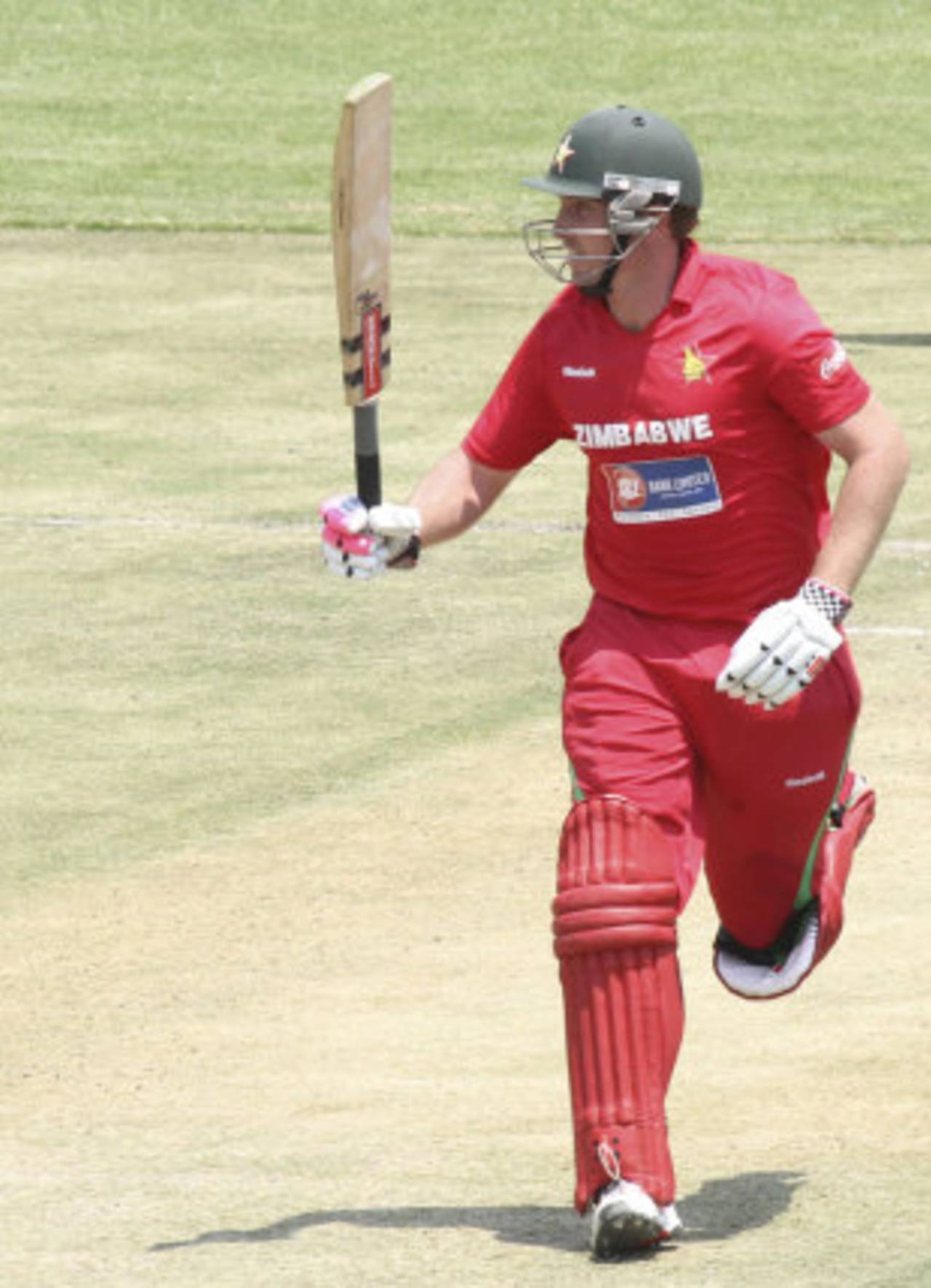 Brendan Taylor celebrates even as he completes his 100th run, Zimbabwe v New Zealand, 1st ODI, Harare, October 20, 2011 