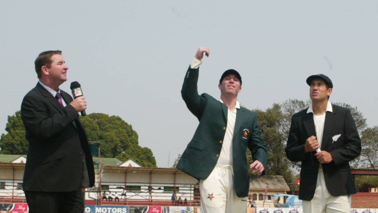 Brendan Taylor spins the coin at the toss as Ross Taylor and Alistair Campbell look on, Zimbabwe v New Zealand, only Test, Bulawayo, 1st day, November 1, 2011