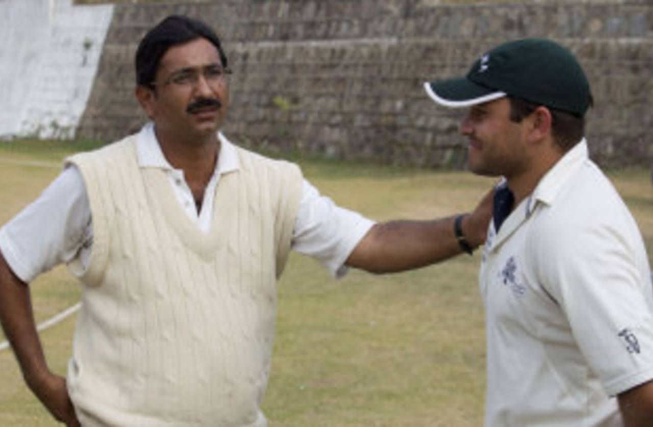 Asif Bajwa, Mohammad Amir's mentor, interacts with a first-class player, Islamabad, November 4, 2011