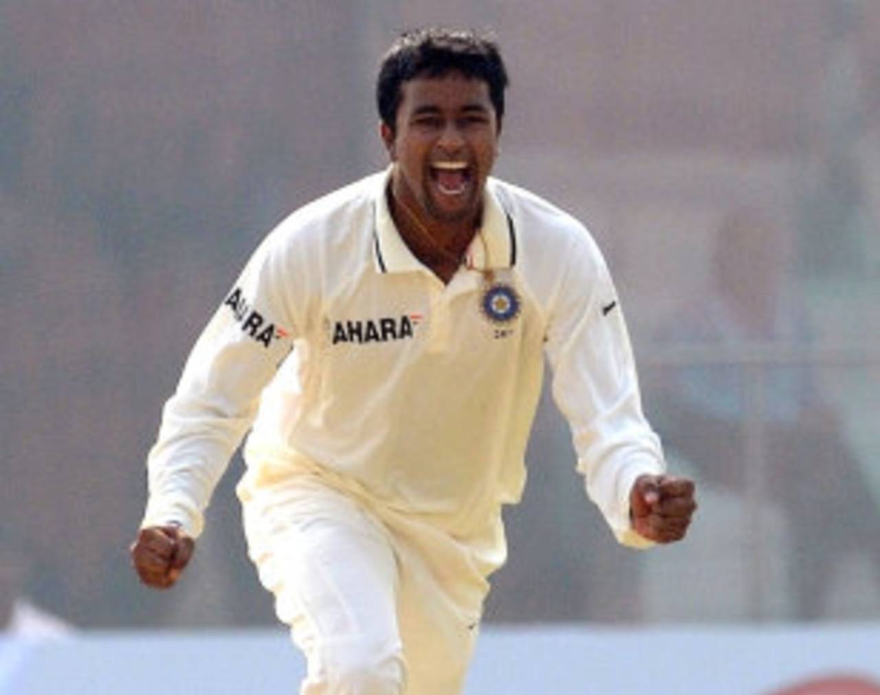 Pragyan Ojha is ecstatic after nailing a wicket, India v West Indies, 1st Test, New Delhi, 1st day, November 6, 2011