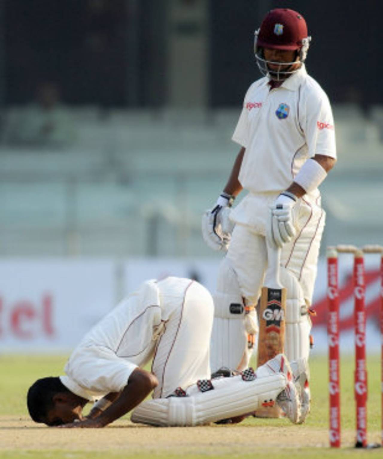 Shivnarine Chanderpaul kisses the ground after reaching his century, India v West Indies, 1st Test, New Delhi, 1st day