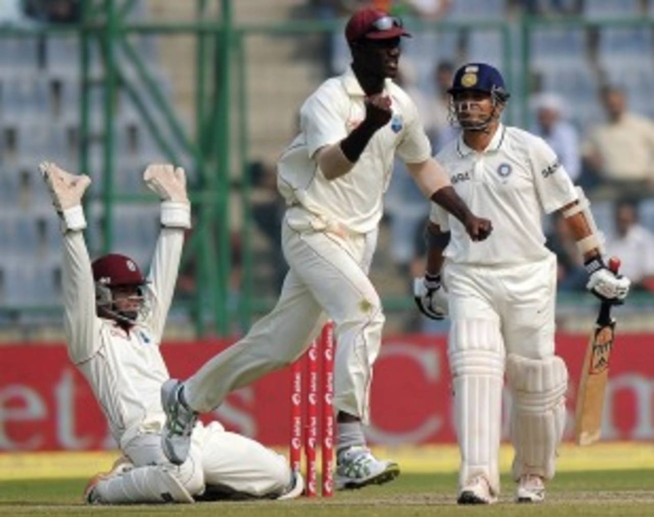 Darren Sammy celebrates Sachin Tendulkar's wicket, India v West Indies, 1st Test, New Delhi, 4th day, November 9, 2011