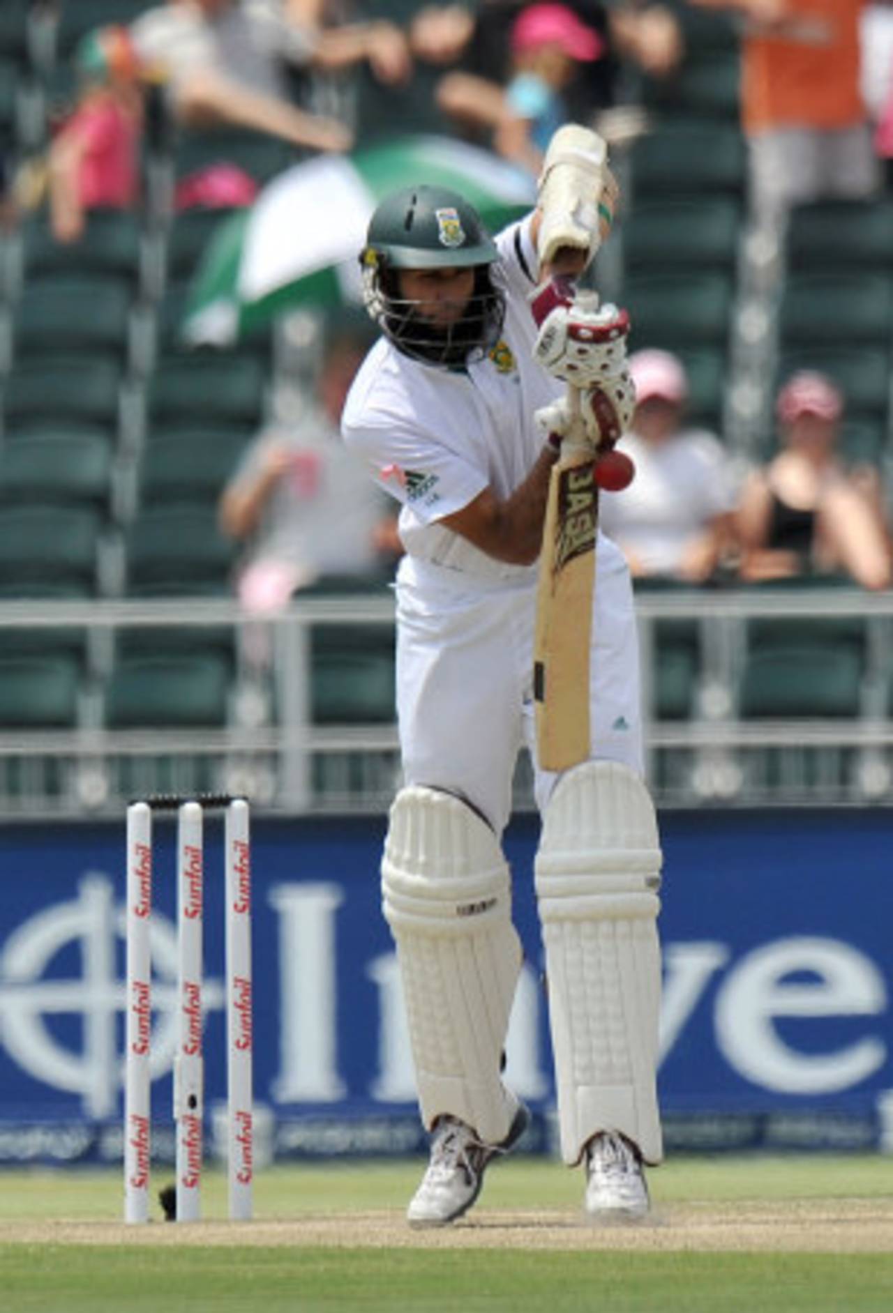 Hashim Amla defends off the back foot, South Africa v Australia, 2nd Test, Johannesburg, 3rd day, November 19, 2011