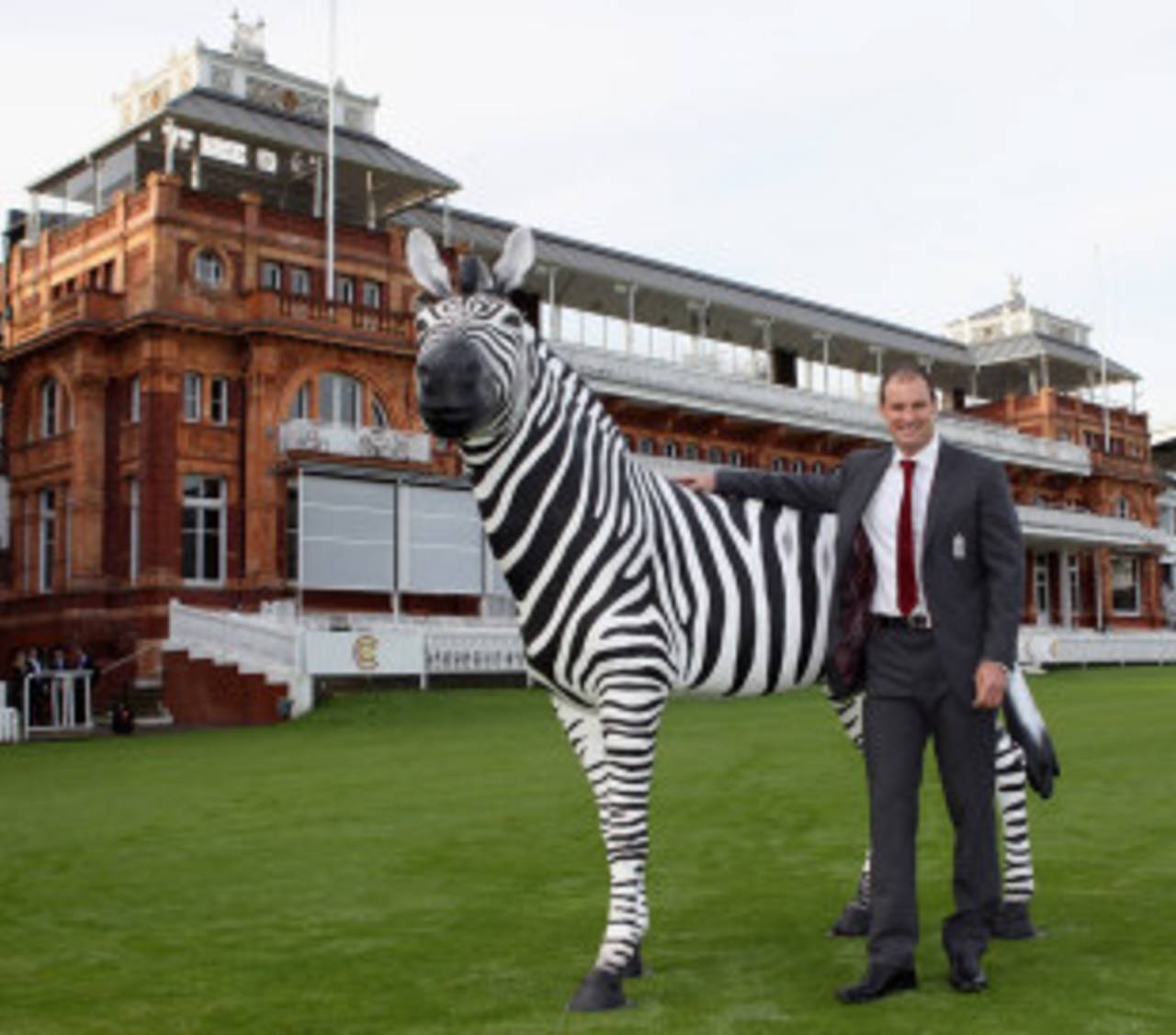 Andrew Strauss poses by a zebra in front of the Lord's pavilion on the day the ECB announced Investec as the new title sponsor of Test cricket, Lord's, November 24, 2011