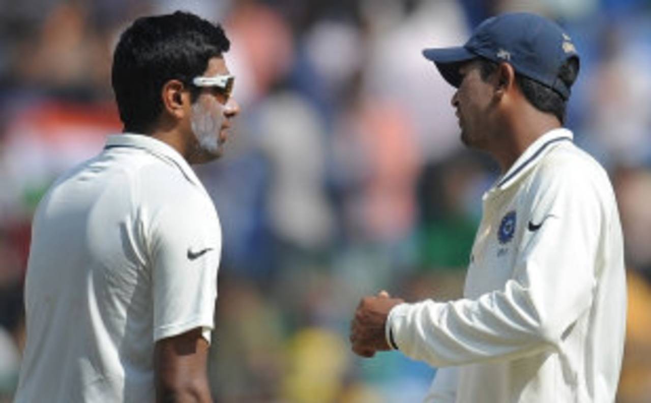 R Ashwin and Pragyan Ojha have a chat, India v West Indies, 3rd Test, Mumbai, 5th day, November 26, 2011 