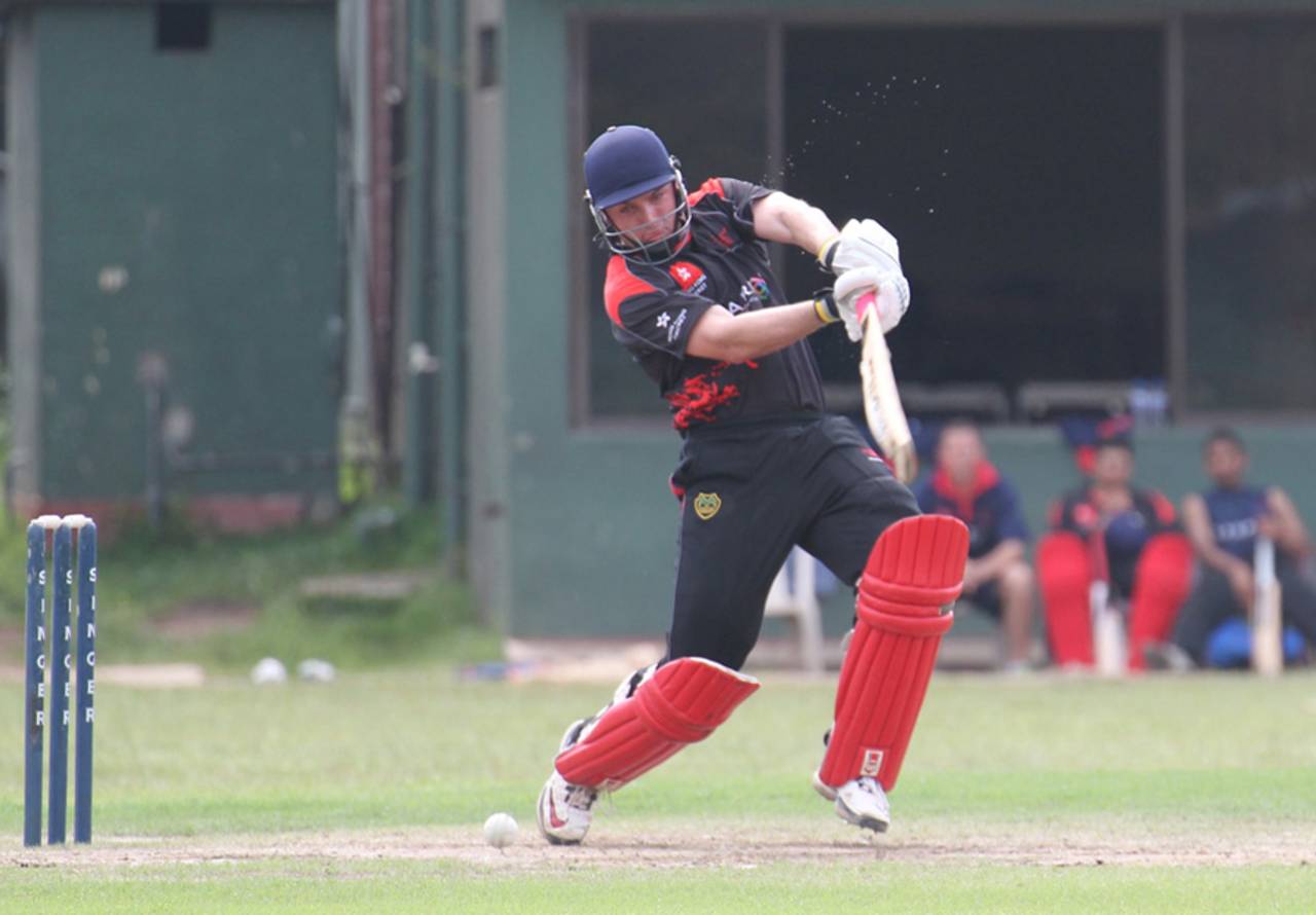 Hong Kong skipper Jamie Atkinson drives the ball against a Sri Lankan Cricket Board XI at Moratuwa Stadium, Sri Lanka, on 29th November 2011