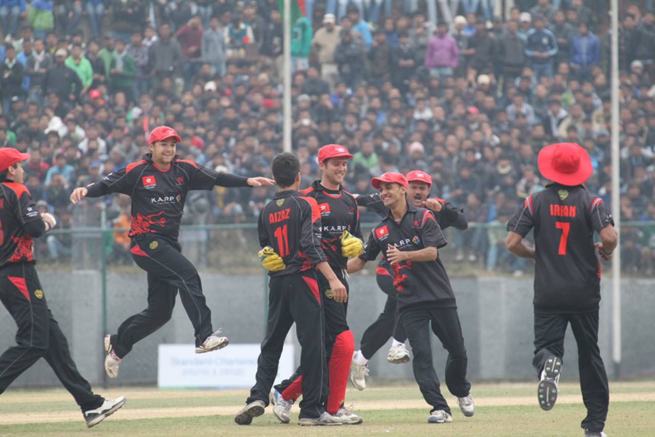 The Hong Kong players celebrate another wicket against Nepal at the ACC Twenty20 Cup 2011 at Tribhuvan University International Cricket Ground, Kathmandu on 3rd December 2011