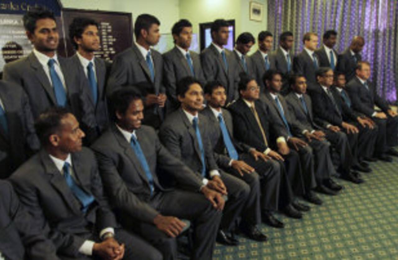 The Sri Lankan team pose for a photograph before leaving for South Africa, Colombo, December 5, 2011 