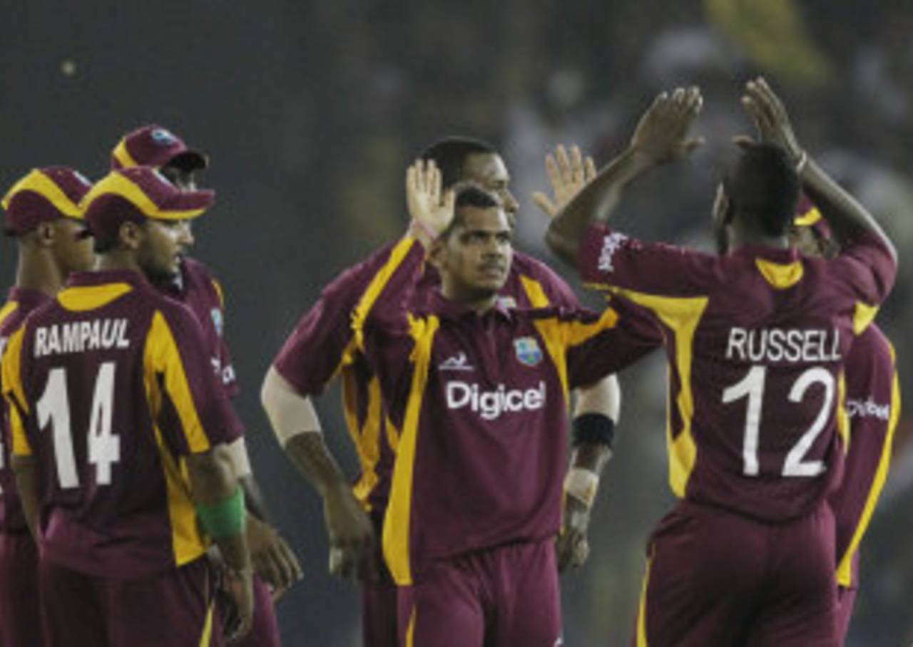 Sunil Narine is congratulated on his first international wicket, India v West Indies, 3rd ODI, Ahmedabad, December 5, 2011