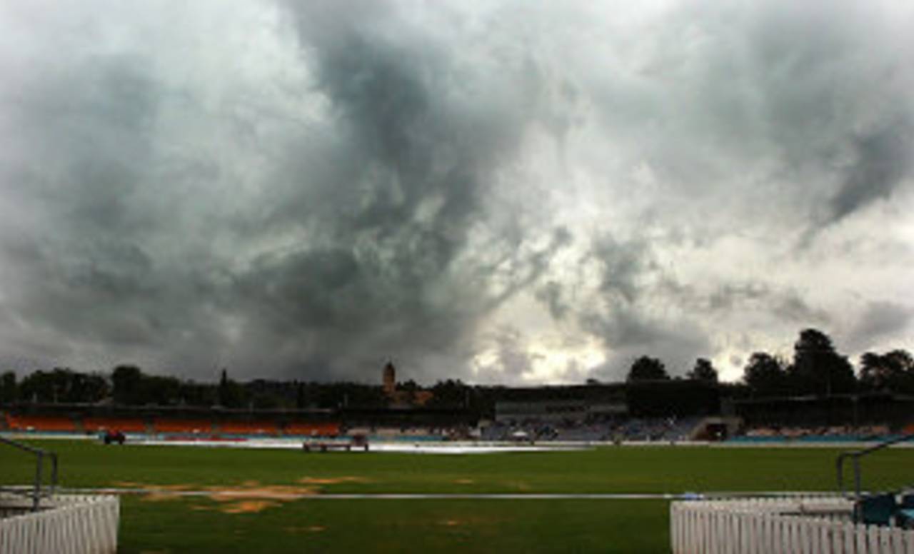 Dark clouds envelope Manuka Oval, Cricket Australia Chairman's XI v Indians, Canberra, 1st day, December 19, 2011