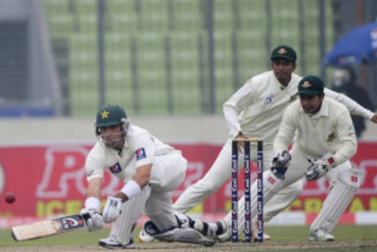 Misbah-ul-Haq shapes up to play a paddle sweep, Bangladesh v Pakistan, 2nd Test, Mirpur, 4th day, December 20, 2011 
