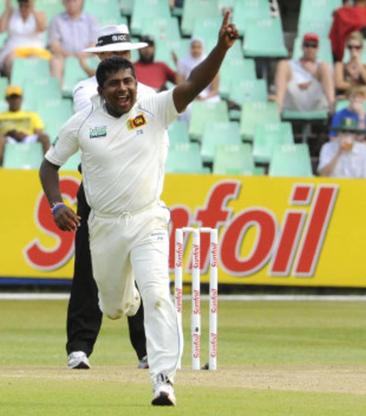 Rangana Herath celebrates the wicket of Ashwell Prince, South Africa v Sri Lanka, 2nd Test, Durban, 2nd day, December 27, 2011