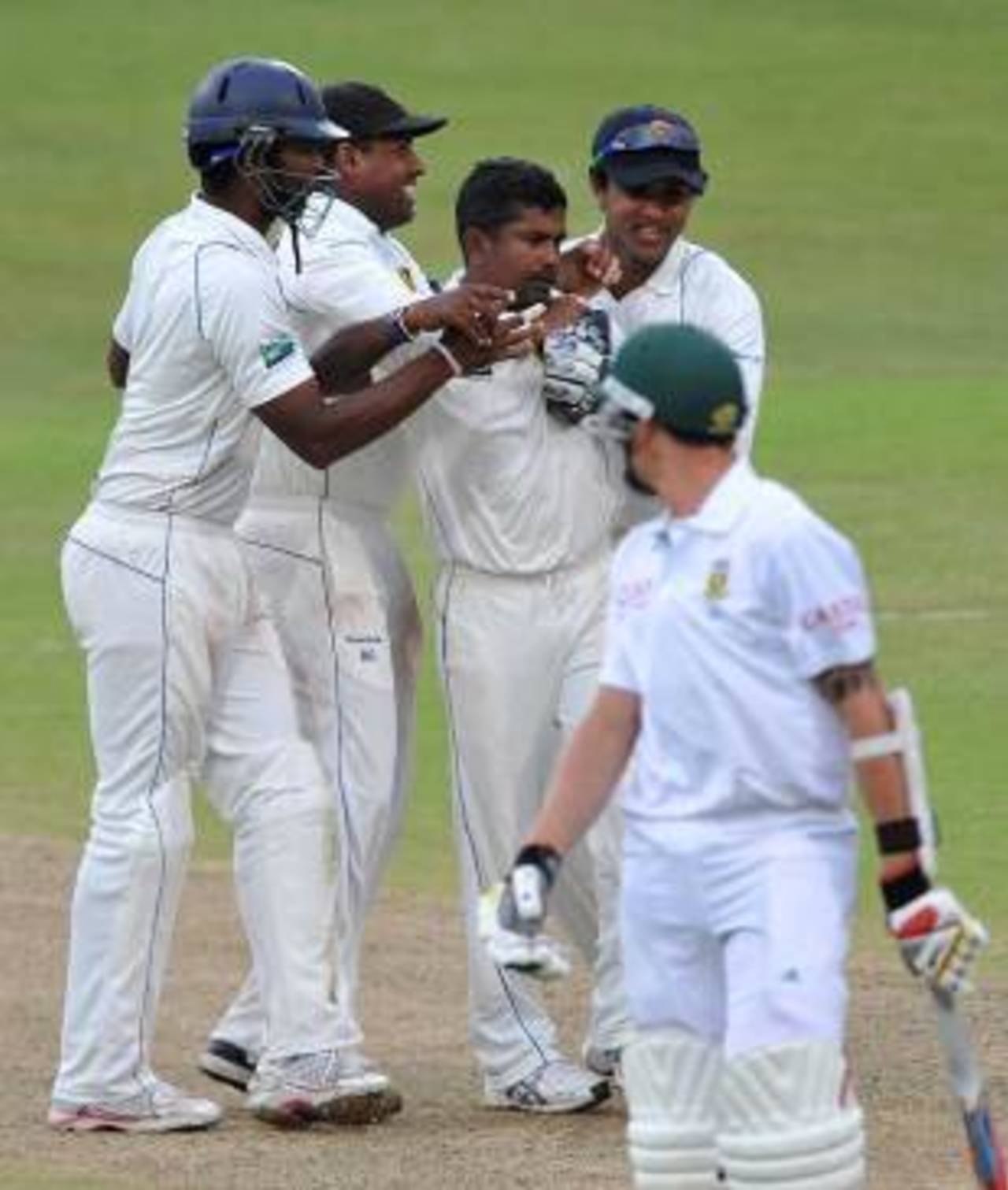 Rangana Herath's nine wickets in the match helped Sri Lanka to a victory they're celebrating with joy&nbsp;&nbsp;&bull;&nbsp;&nbsp;Getty Images