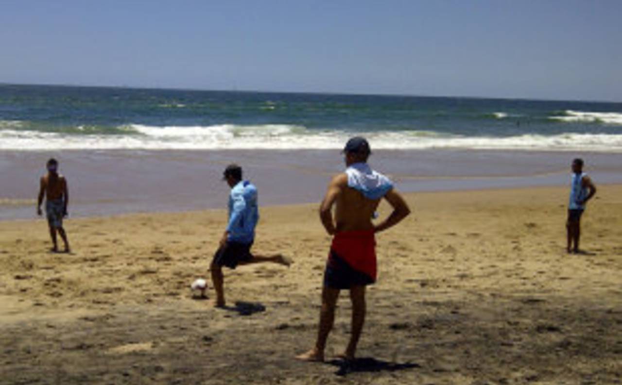Tillakaratne Dilshan on the ball as Sri Lanka play football on the beach in Durban following their win the second Test, December, 30, 2011