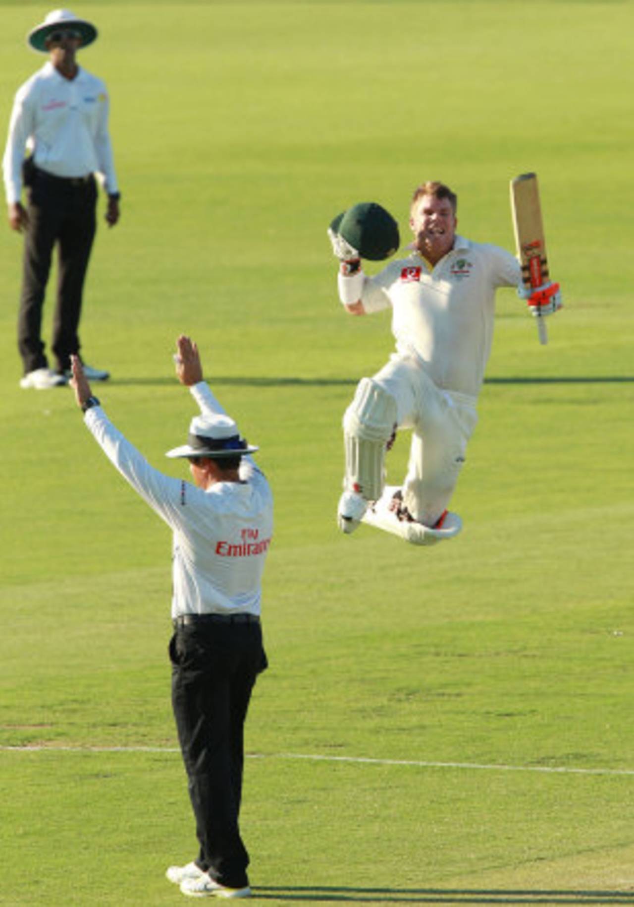 David Warner leaps in celebration of his hundred, Australia v India, 3rd Test, Perth, 1st day, January 13, 2012