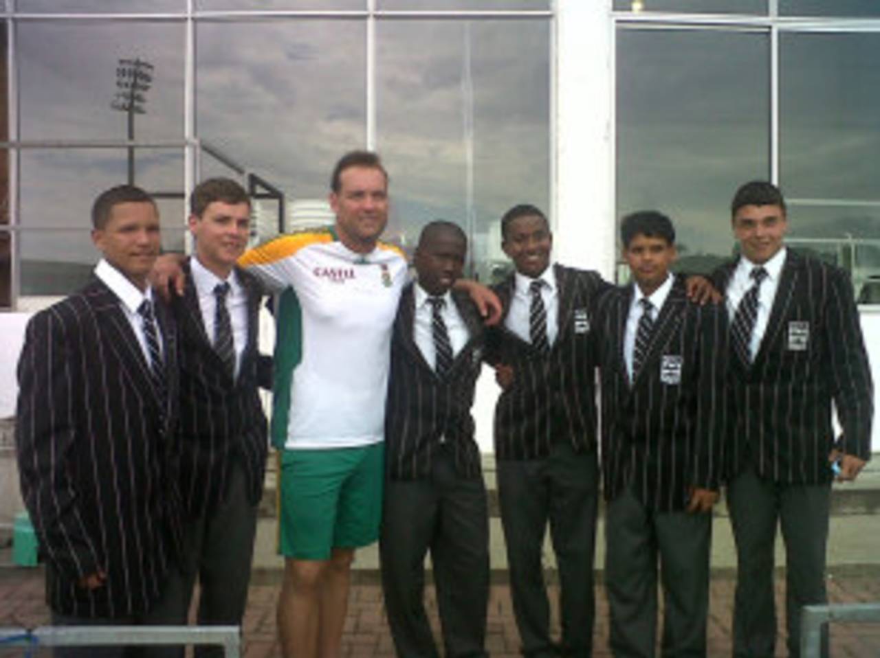Jacques Kallis with students who have received scholarships from the Jacques Kallis Foundation, East London, January 13, 2012