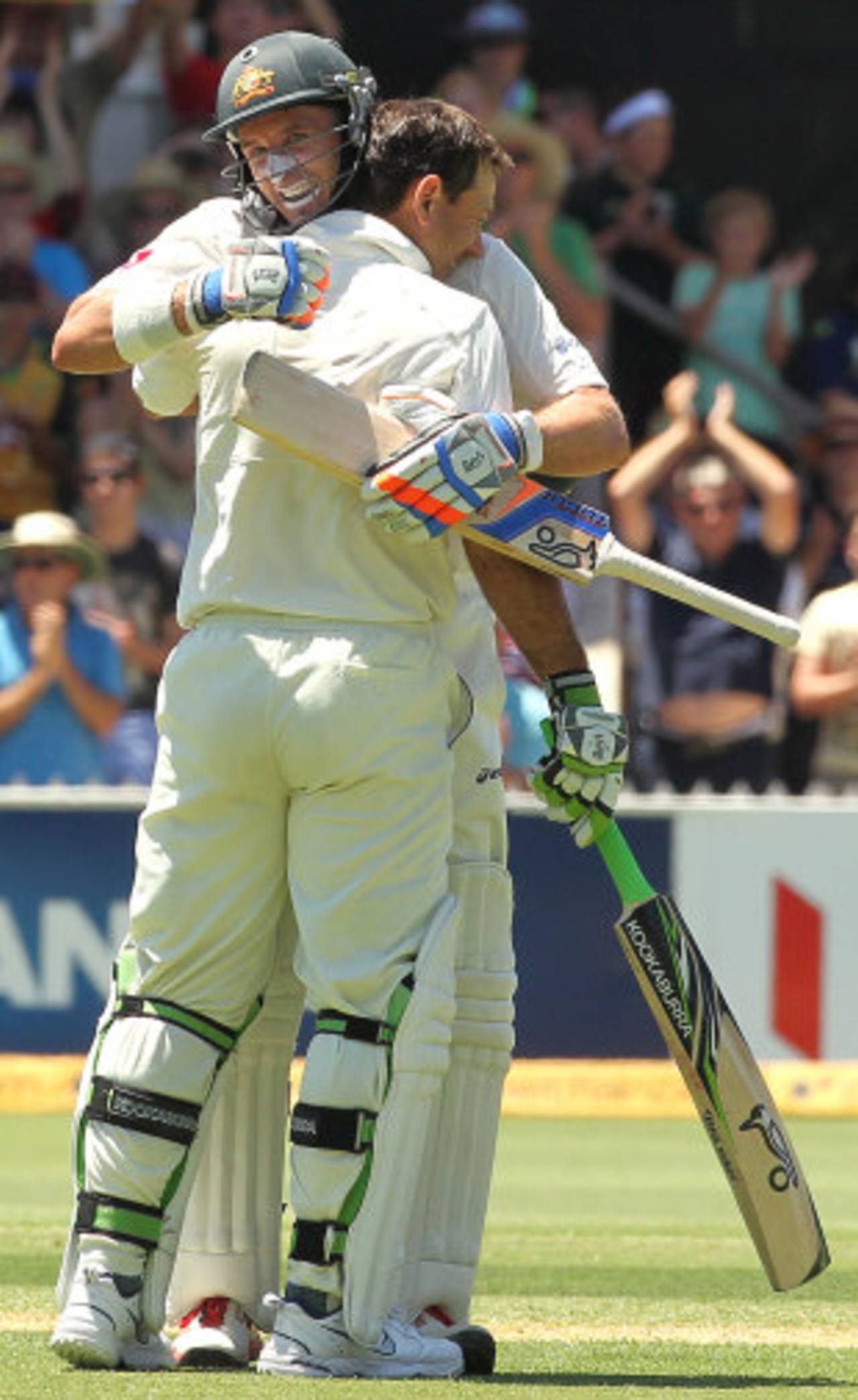 Ricky Ponting gets a hug from Michael Hussey after getting to 200, Australia v India, 4th Test, Adelaide, 2nd day, January 25, 2012