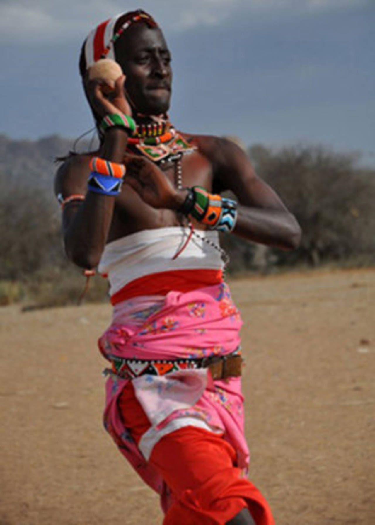 Nissan Jonathan Ole Meshami, a Maasai warrior, bowls