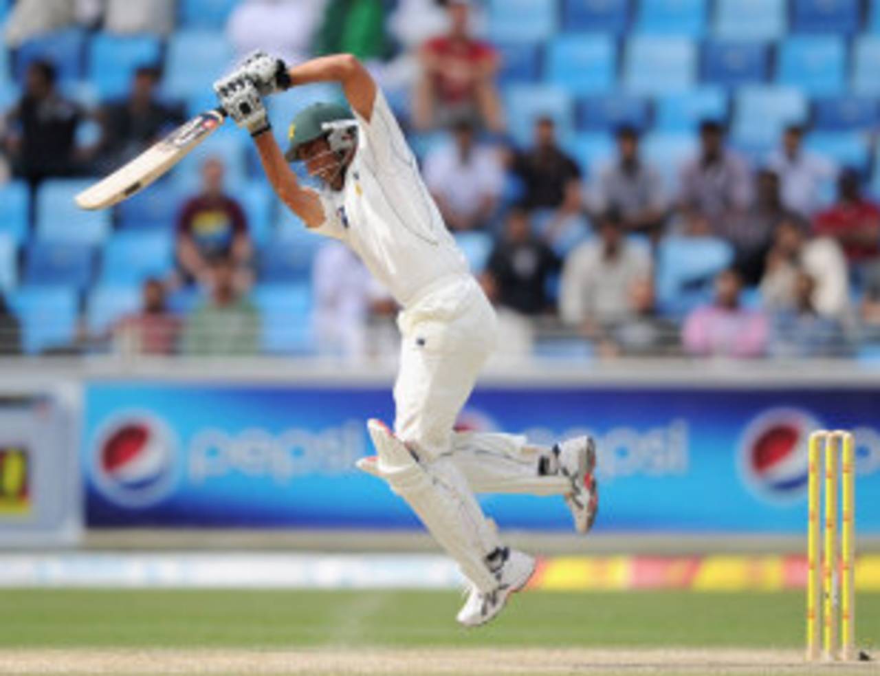 Younis Khan jumps even as he drives down the ground, Pakistan v England, 3rd Test, Dubai, 2nd day, February 4, 2012