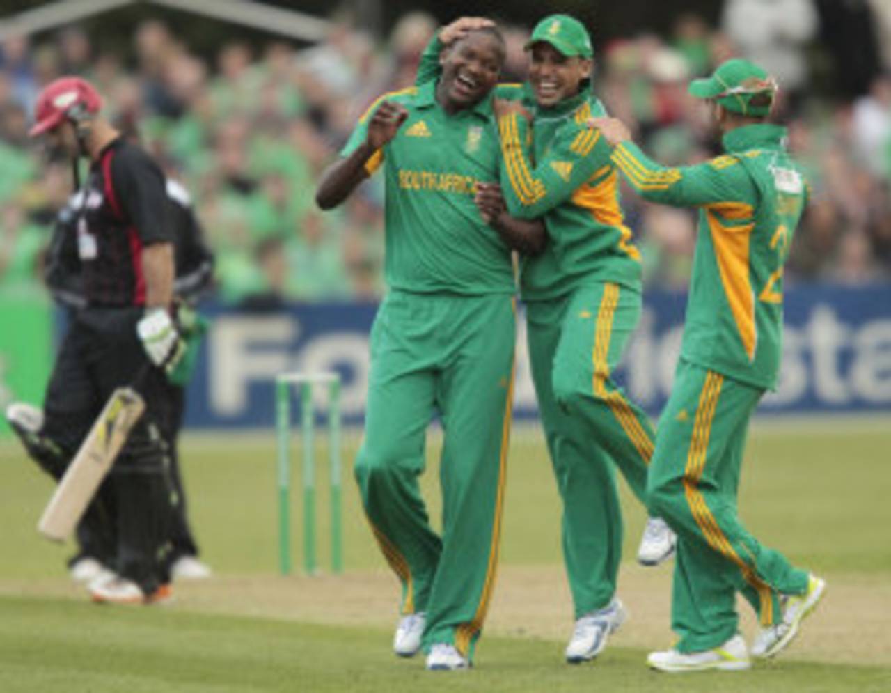 Lonwabo Tsotsobe is congratulated on one of four wickets, Canterbury v South Africans, Twenty20, Christchurch, February 15, 2012 